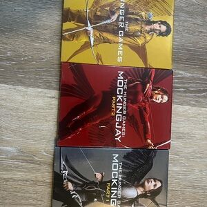 The Hunger Games Trilogy DVD Set - Yellow, Red, Black Covers